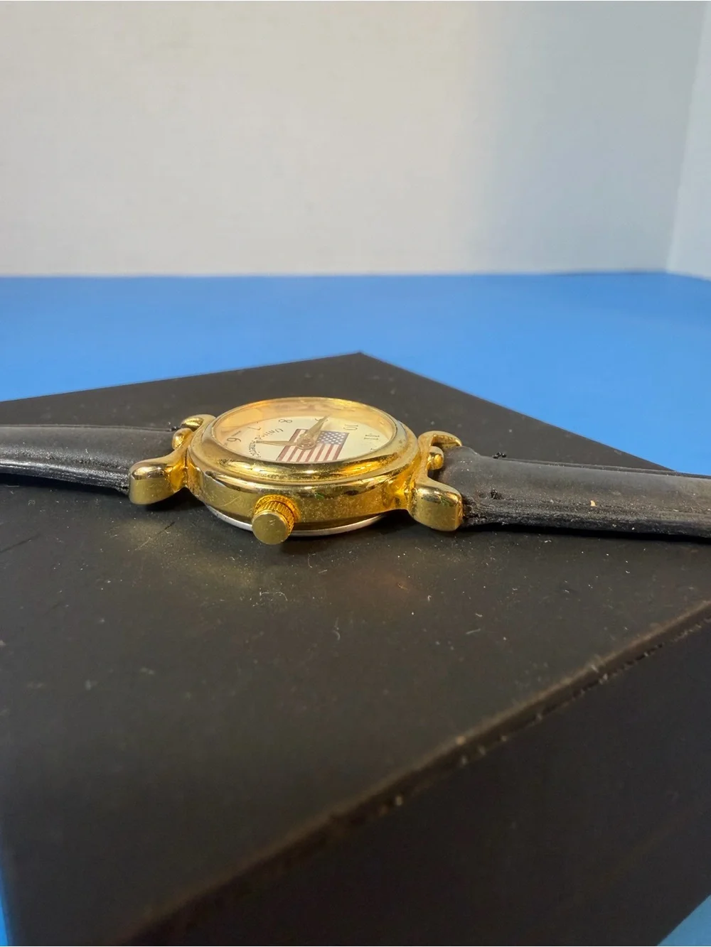 Gold Dial Black Leather Strap Women's Watch with American Flag Accent